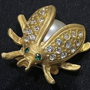 Cute as a bug brooch - 1.25”x 1” - gold tone, rhinestones clear/green&faux pearl